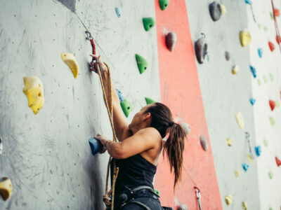 woman on a climbing wall